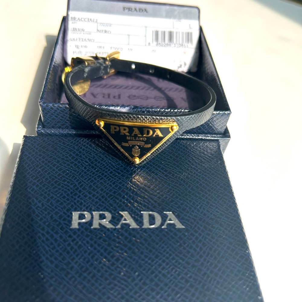 Authentic Prada Bracelet in size large adjustable leather strap.
